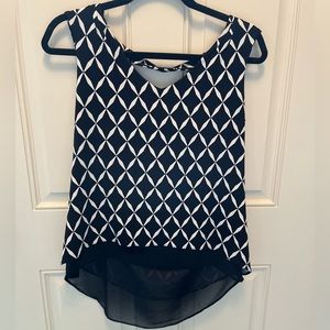 Hi/Lo sleeveless blouse with sheer under layer and cute back detail